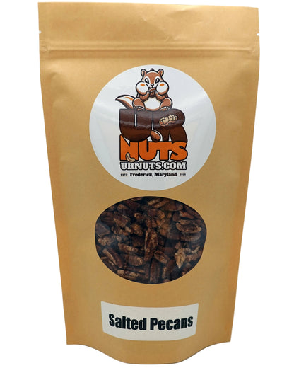 A stand-up kraft paper pouch of 'Salted Pecans' from UR Nuts, featuring a circular white logo with a cartoon squirrel and a clear window showing the dark brown salted pecans inside.
