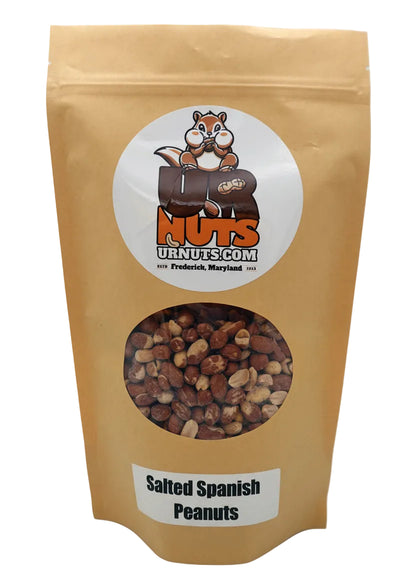 A stand-up kraft paper pouch of 'Salted Spanish Peanuts' from UR Nuts featuring a cartoon logo and a clear window showing the peanuts inside.