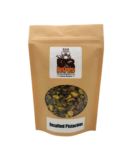 A stand-up kraft paper pouch of unsalted pistachios with a clear oval window showing the green and brown nuts inside. The pouch has a white label at the top with a nut logo reading UR Nuts.