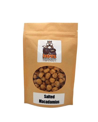 A stand-up kraft paper pouch of UR Nuts Macadamias (Salted) with a clear window showing the nuts inside, on a light gray background.