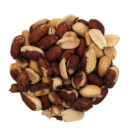 A top-down view of mixed nuts, including Salted Redskin Peanuts, in a clear glass bowl on a white background.