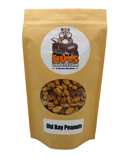 A stand-up pouch of Old Bay Peanuts from UR Nuts, featuring a gold-colored bag with a clear window showing the peanuts inside and a cartoon chipmunk logo.