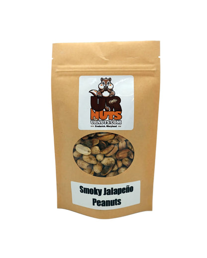 A stand-up kraft paper pouch of 'Smoky Jalapeño Peanuts' from UR Nuts, featuring a clear window showing the peanuts inside and a white label with the brand logo.