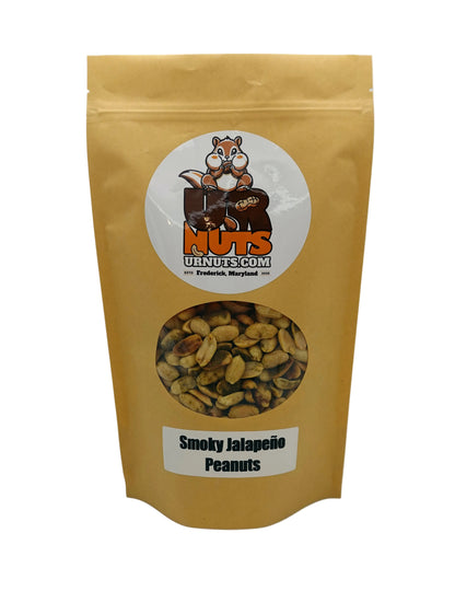 A stand-up pouch of Nuts UR Nuts  Smoky Jalapeño Peanuts, featuring a tan kraft paper bag with a circular clear window showing the peanuts inside.