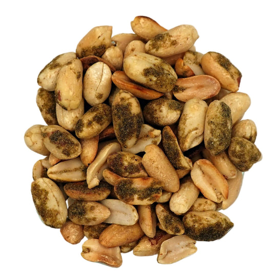 A top-down view of a clear glass bowl filled with Smoky Jalapeño Peanuts, on a plain white background.