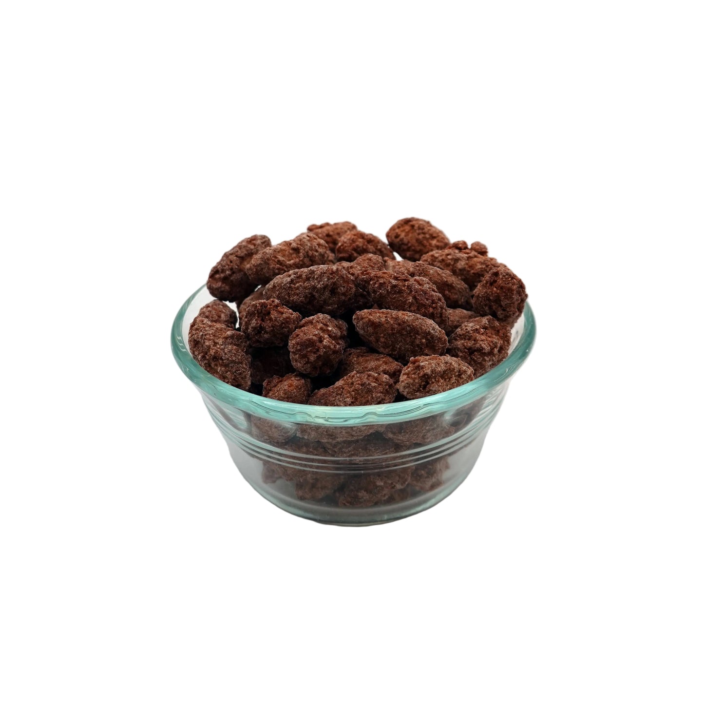 A clear glass bowl filled with cinnamon glazed almonds, photographed on a plain light gray studio background.
