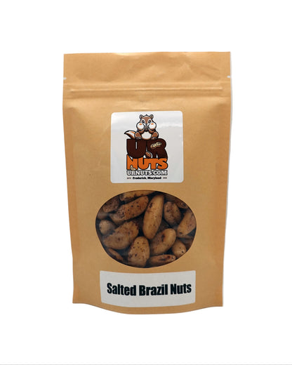 A stand-up kraft paper pouch of Salted Brazil Nuts with a clear window showing the nuts inside. The pouch features a white label with the 'UR Nuts' brand logo and a white label at the bottom reading 'Salted Brazil Nuts'.