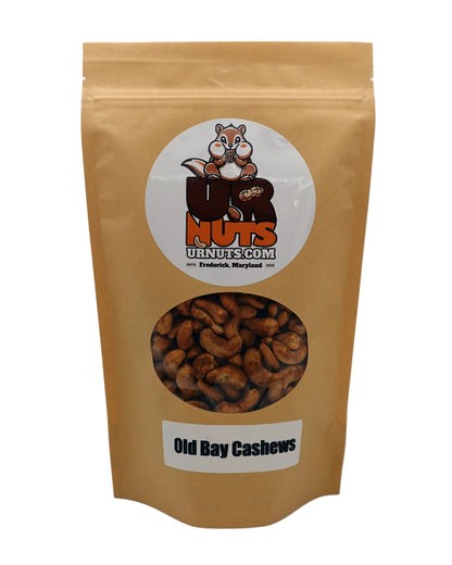 A stand-up kraft paper pouch of UR Nuts Old Bay Cashews. 